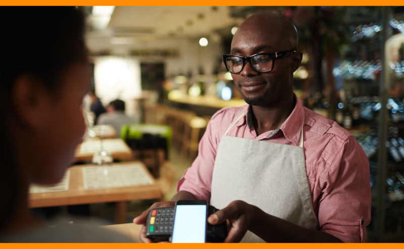 end-to-end erp and pos system in kenya: cashier with customer